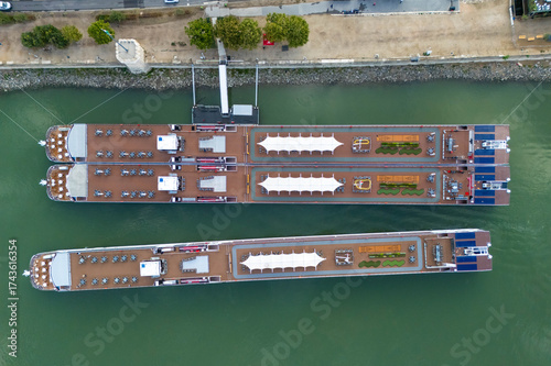Top Down Aerial View of River Cruise Boats in the Danube River Budapest Hungary