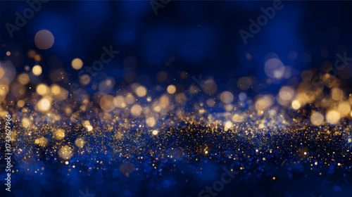 A beautiful abstract background featuring golden and blue bokeh lights, creating a festive and magical atmosphere