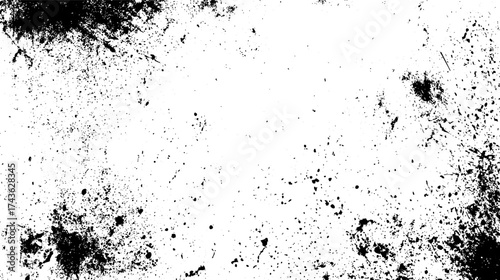 A textured abstract background featuring a blend of black and white splashes, creating a moody and artistic effect
