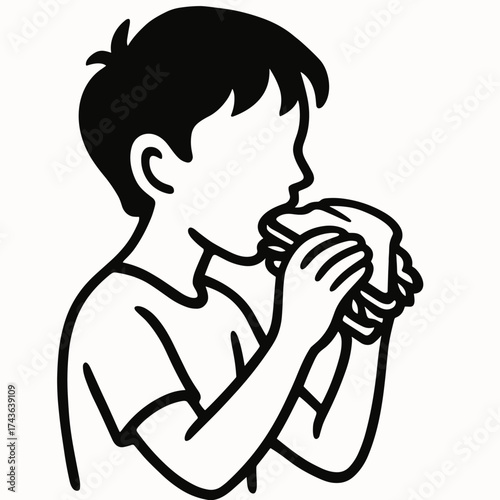 Boy eating vegetarian sandwich