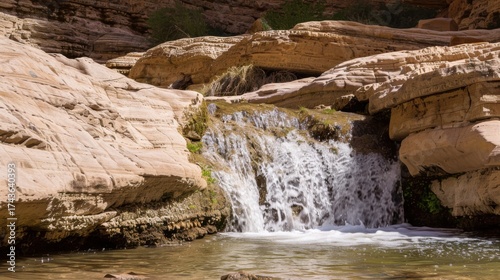 Natural Waterfall Wonders: Flowing Streams, Forested Mountains, and Moss-Covered Rocks in Outdoor Landscapes