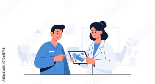 Two medical professionals discussing a digital image displayed on a tablet device, analyzing data.