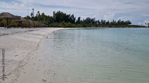 Blue tropical sea with an island. Maldives