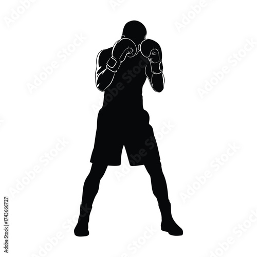 Boxer in Defensive Stance Showing Determination and Strength