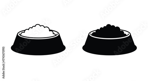Two contrasting pet food bowls one white and one black side by side