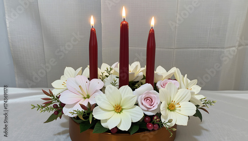 three candles centerpiece, wreath base, warm amber glow
