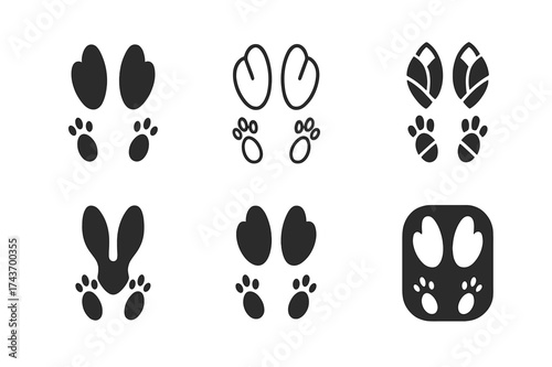 Rabbit Track Logos. Animal footprints. Set Logo of rabbit tracks: two large hind feet with small front paws. harmonious logo variations of the same emblematic