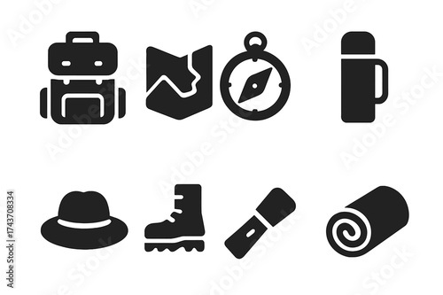 Travel Essentials Icons. Travel essentials. Filled icon set of Travel essentials: backpack, map, compass,