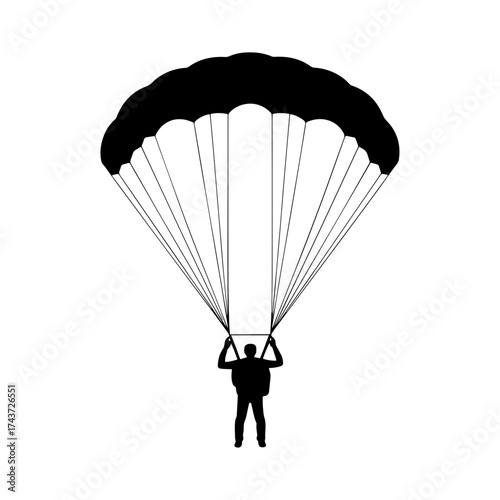 Silhouette of person with parachute in sky 
