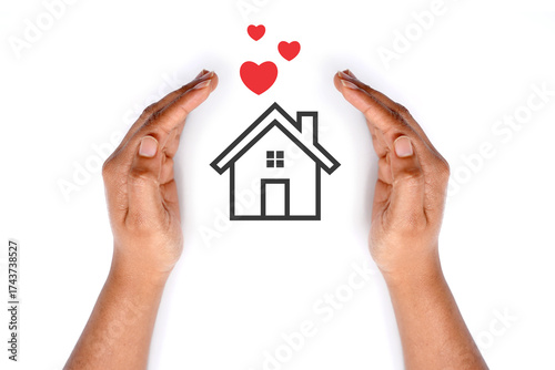House with hearts covered by hands. meaningful image. white background