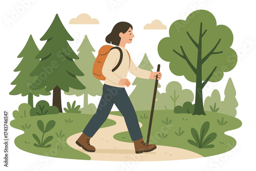 Woman hiking in forest pathway with backpack and walking stick