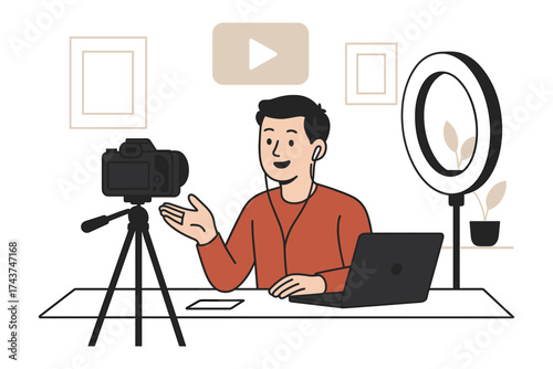 Content creator recording video tutorial in minimalist home studio with camera and laptop