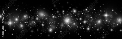 Cosmic stardust, sparkling particles, and glowing stars.