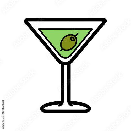 A martini glass with a green olive garnish and a light green liquid inside.