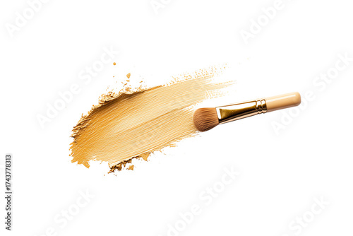 Cosmetic brush with foundation swatch on a white background, showcasing beauty tools and makeup artistry for self-care enthusiasts.