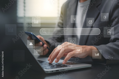SEO search engine optimization. Businessman using smartphone with laptop searching browsing internet data Information networking from website