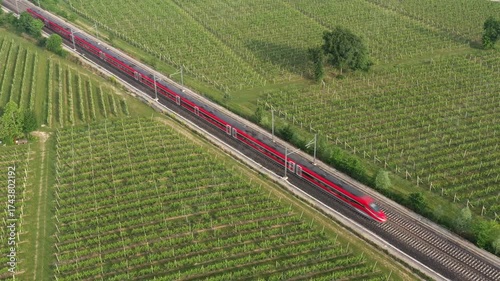 Wallpaper Mural red train,frecciarossa 1000,aerial view,speed,red high-speed train,two trains,top view,italian trains,frecciarossa,two trains towards each other,two red trains,a diagonal,vineyard,red train aerial vie Torontodigital.ca