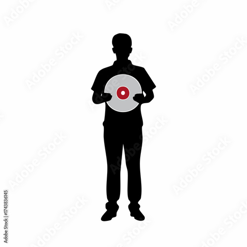 Silhouette of a man holding a vinyl record, showcasing retro musical era with a classic music disc