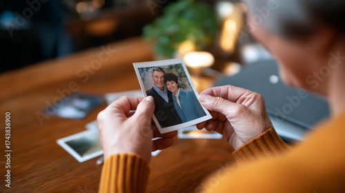 Family members arranging family photo albums together memory sharing family history nostalgic moment generational memories family documentation shared heritage legacy