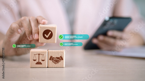 Tableau sur toile Compliance Approval with Legal and Partnership Icons on Wooden Blocks