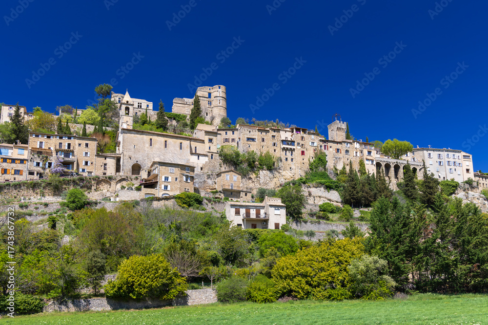 Fototapeta premium Montbrun les Bains village perched on hillside in Drome, France