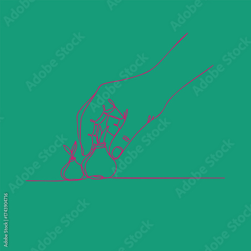 Close-up of a hand gently planting small bulbs into the soil for gardening or planting activity