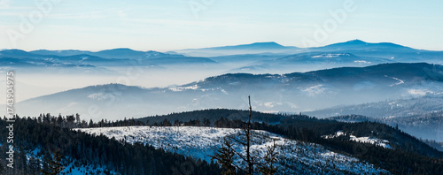 Moravskoslezske Beskydy mountains with highest Lysa hora hill in Czech republic from Barania Gora hill in Beskid Slaski mountains in Poland during winter