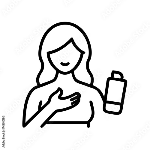 Young woman applying hand cream while smiling in minimalist style  