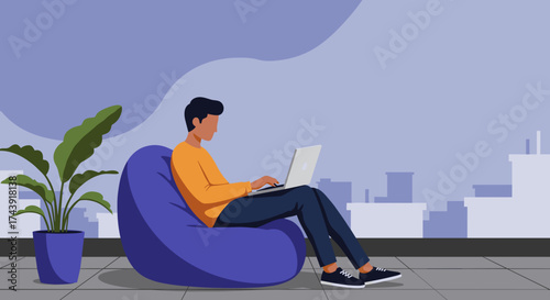 Man works on laptop on a bean bag in a modern comfortable workspace Remote work freelancing lifestyle