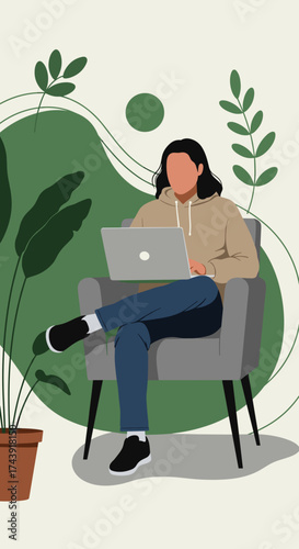 Person working remotely on laptop in a comfortable green home office setting