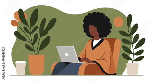 Black woman works remotely on laptop in a modern plantfilled home office