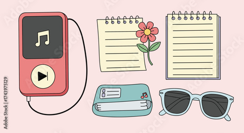 A collection of cute stationery and personal items arranged on a light pink background.