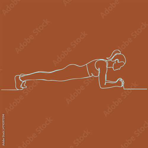 Woman performing plank exercise on a brown emphasizing core strength and stability