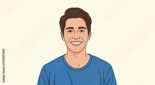 A smiling young man in a blue shirt looks directly ahead with a friendly expression on his face.