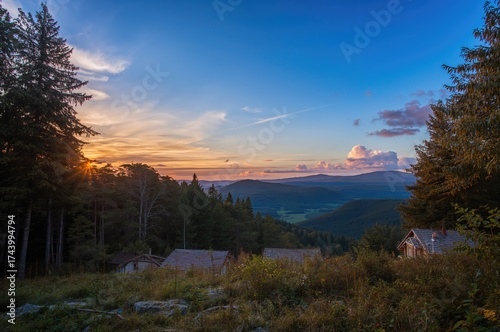 Fototapeta Naklejka Na Ścianę i Meble -  Evening panorama of the Beskidy mountains captured from Gora Parkowa