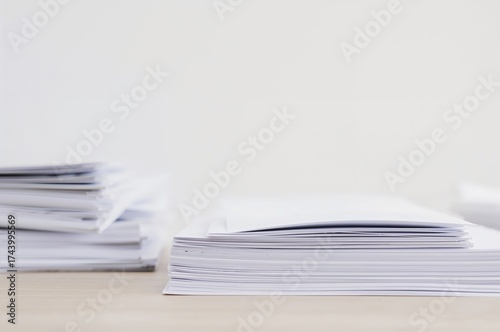 Piles of paper sheets arran...