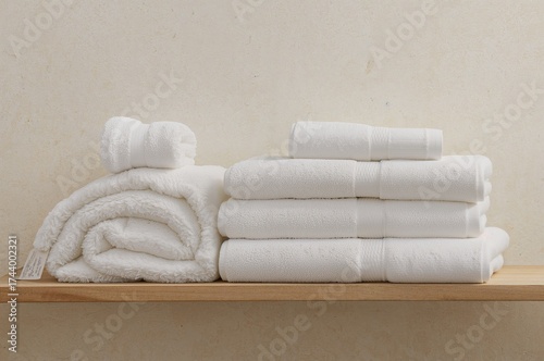 Pile of bath towels arrange...