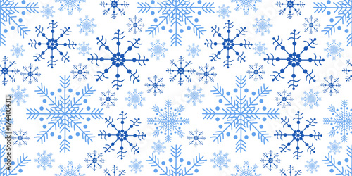 Blue snowflake seamless pattern on white background. Winter texture with frosty snowflakes of different shapes, sizes, perfect for Christmas wrapping paper, festive greeting cards, winter background.