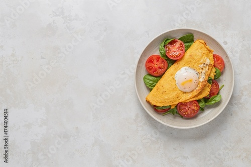 Omelette filled with spinac...