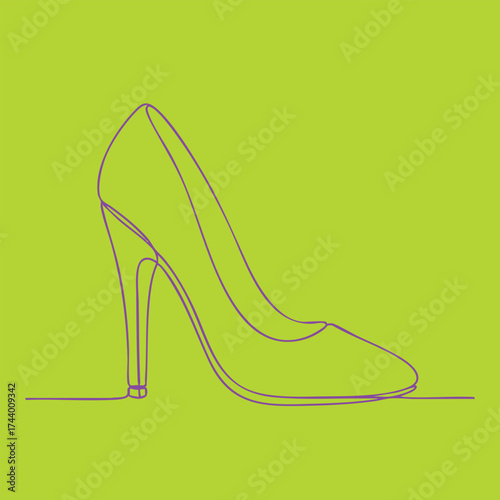 Elegant high-heeled shoe silhouette with a sleek design on a vibrant green