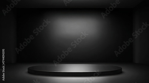 black pedestal illuminated by a spotlight,