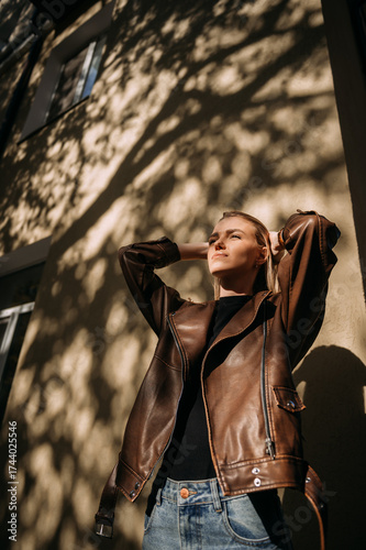 A girl in a leather jacket 7084.