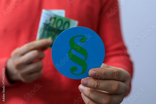 Person holding euro banknot...