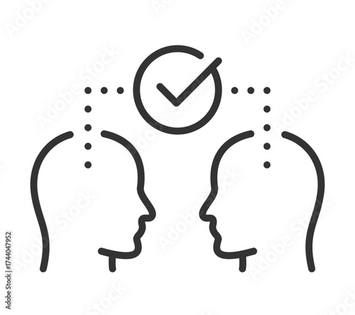 Outline of two human heads with checkmark illustrating agreement and communication