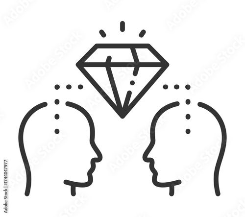 Two human profiles with diamond symbolizing shared knowledge and creativity