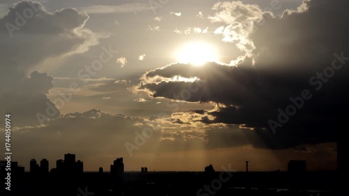 Sunset colors sweep across the city, captured in a smooth time-lapse motion.