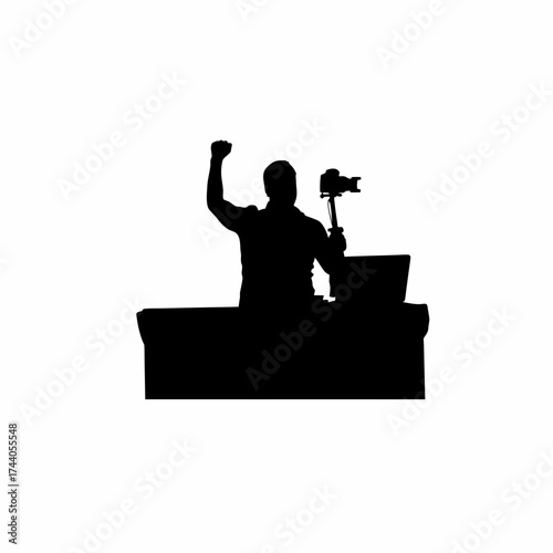 Silhouette of a social media content creator recording a vlog at a desk isolated on white background