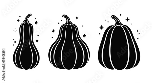Three silhouettes of pumpkins in a row.