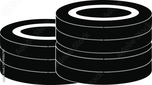 Stack of black and white tires on a white background