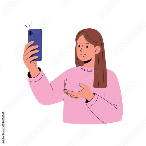 A young woman is taking a selfie with her smartphone in a pink sweater.